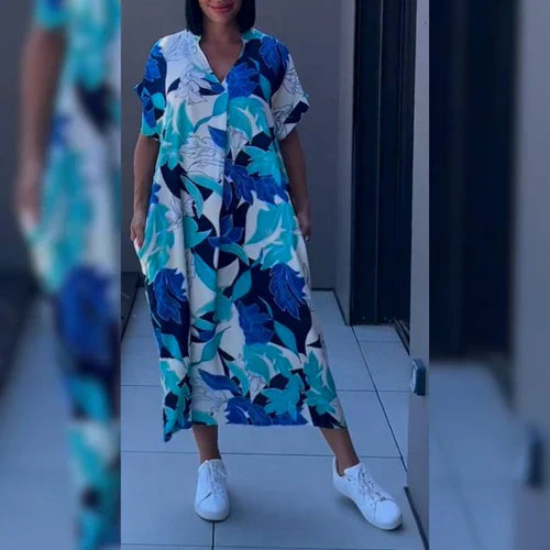 Svea – Elegant Blommig Klänning för en Romantisk och Sofistikerad Look