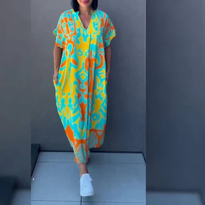 Svea – Elegant Blommig Klänning för en Romantisk och Sofistikerad Look